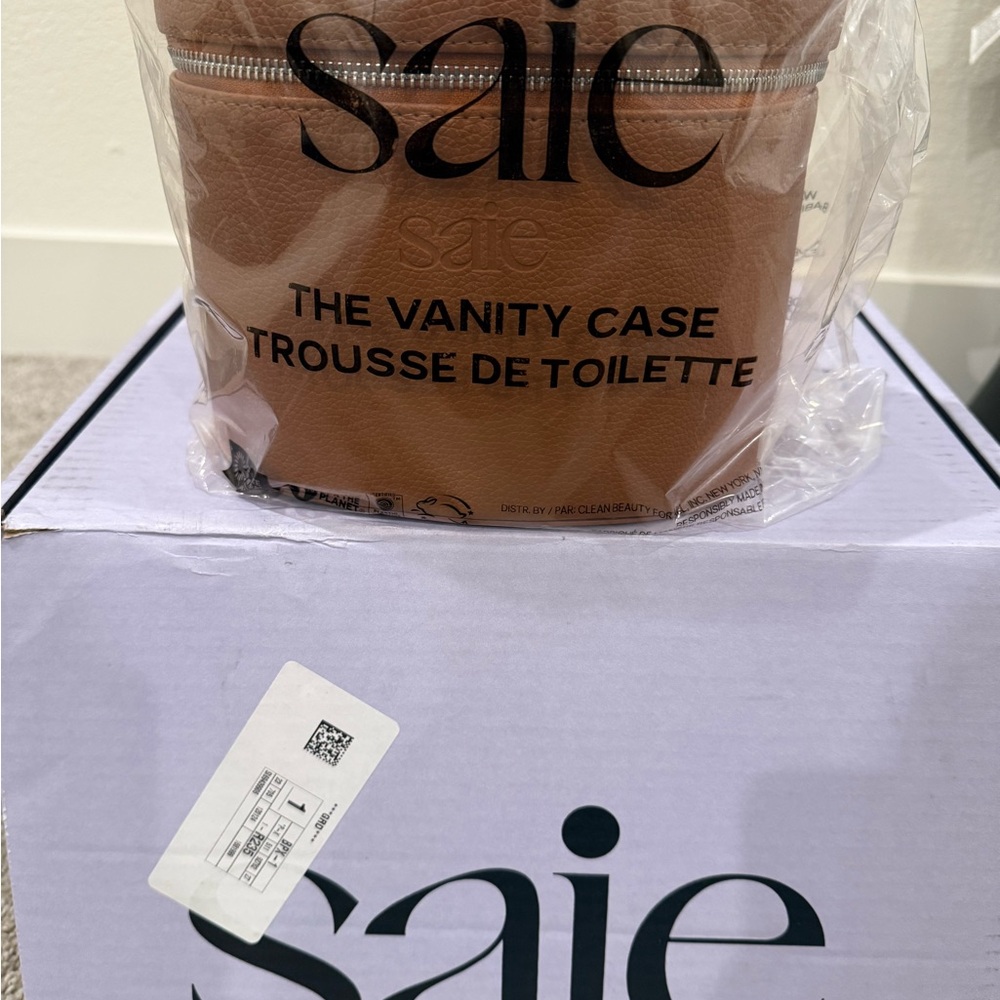 Brand new Saie vanity case with box